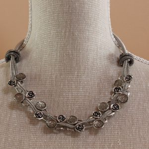 metal flower and faceted metal necklace